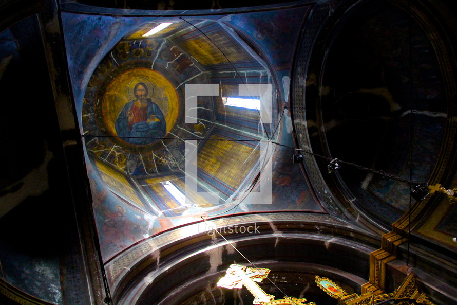 painting of Jesus on the ceiling of a dome 