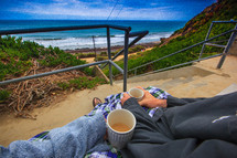 enjoying morning coffee while watching the ocean