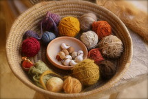 Balls of yarn in a basket.