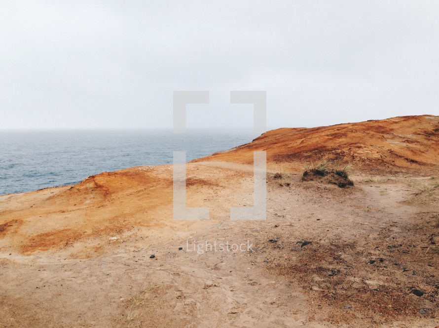 top of cliffs along a shoreline 