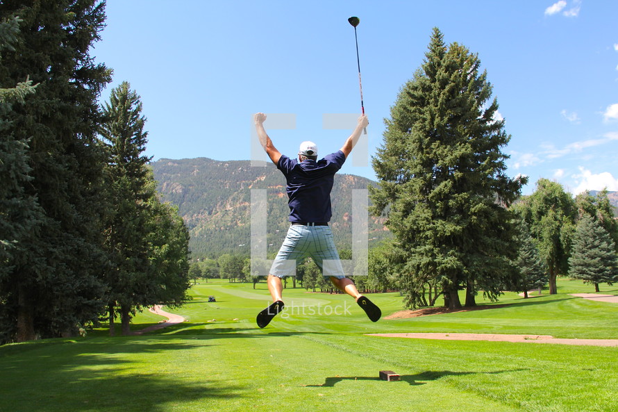 Man celebrating on the golf course 