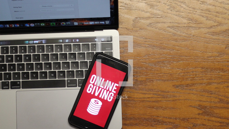 online giving app on a cellphone on a laptop computer 