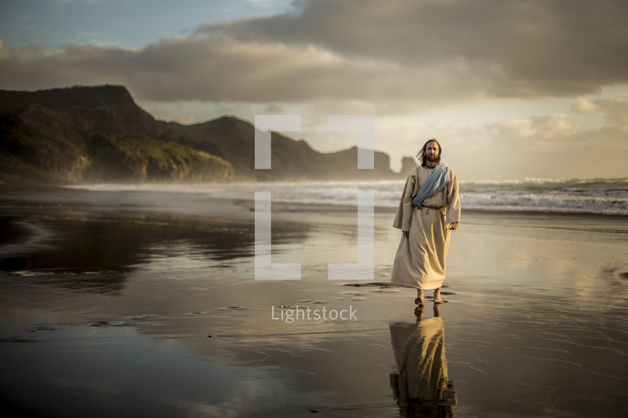 Jesus walking along a shore 
