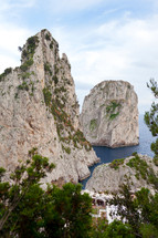 Faraglioni, famous giant rocks, Capri island in Italy