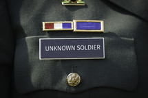 Unknown Solider printed on the military name badge of uniform.