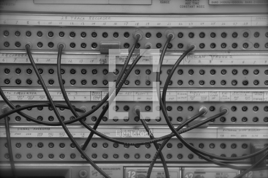 Connecting wires on a telephone switch board 