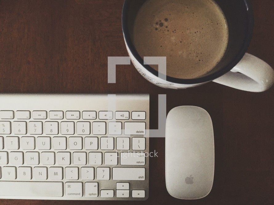 mouse, keyboard, and coffee mug