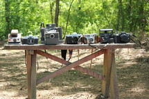 cameras on a bench