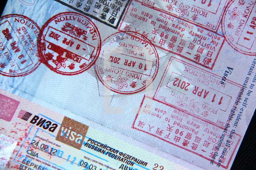 Visa stamps in a passport 