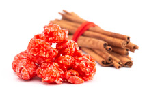 Red Cinnamon Popcorn on a White Background