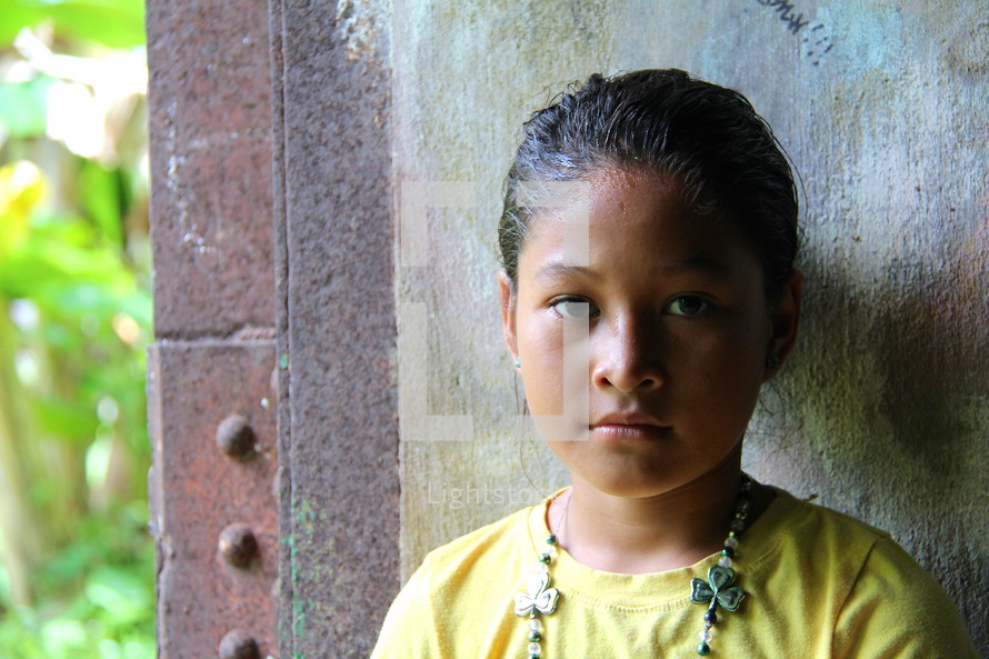 Face of a young polynesian girl  