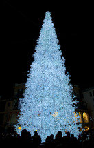 Christmas tree lit in blue. Lights of Salerno