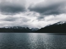 cloudy sky over a mountain lake in winter 