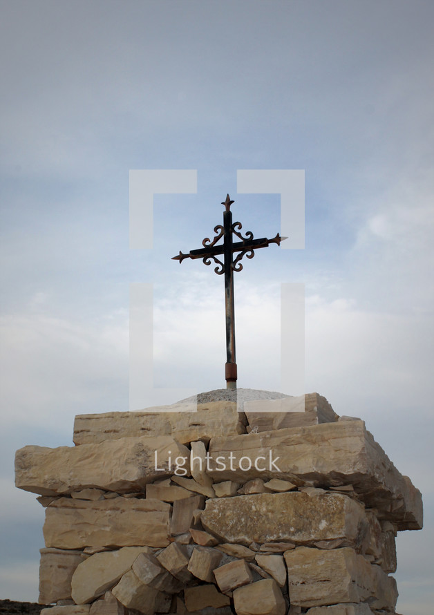 cross on a rock steeple 