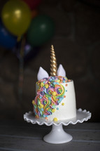 unicorn birthday cake and balloon 