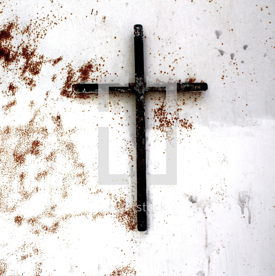 A cross on a door along the road on the Mount of Olives