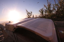 Open bible on pier