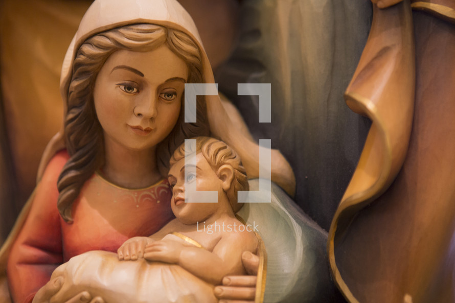 figurine of mother Mary and baby jesus 