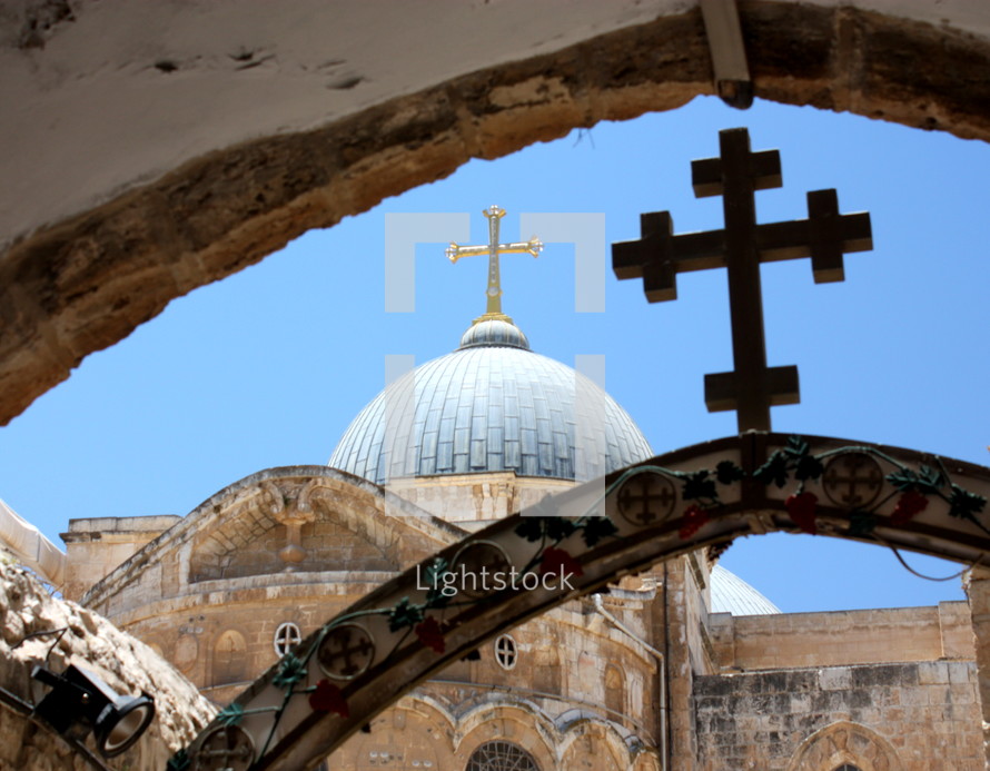 cross topper on The Church of the Holy Sepulcher, called the Church of the Resurrection by Greek Orthodox, in the Holy Land
