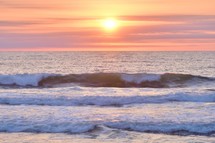 ocean waves at sunset 