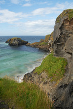 Ocean side rocky cliffs.