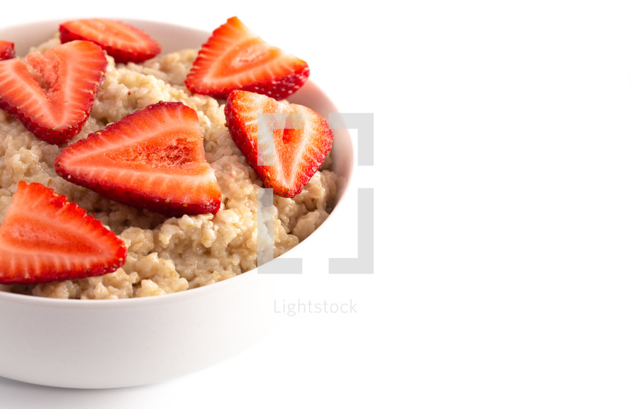 Oatmeal with Strawberries Isolated on a White Background