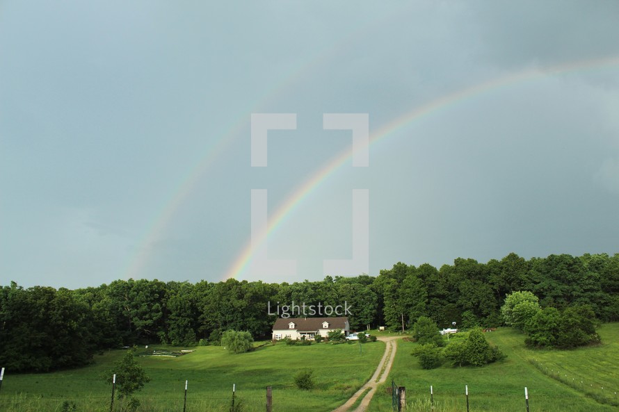 rainbow over a rural countryside 