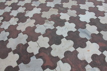 puzzle piece pattern on a tile floor