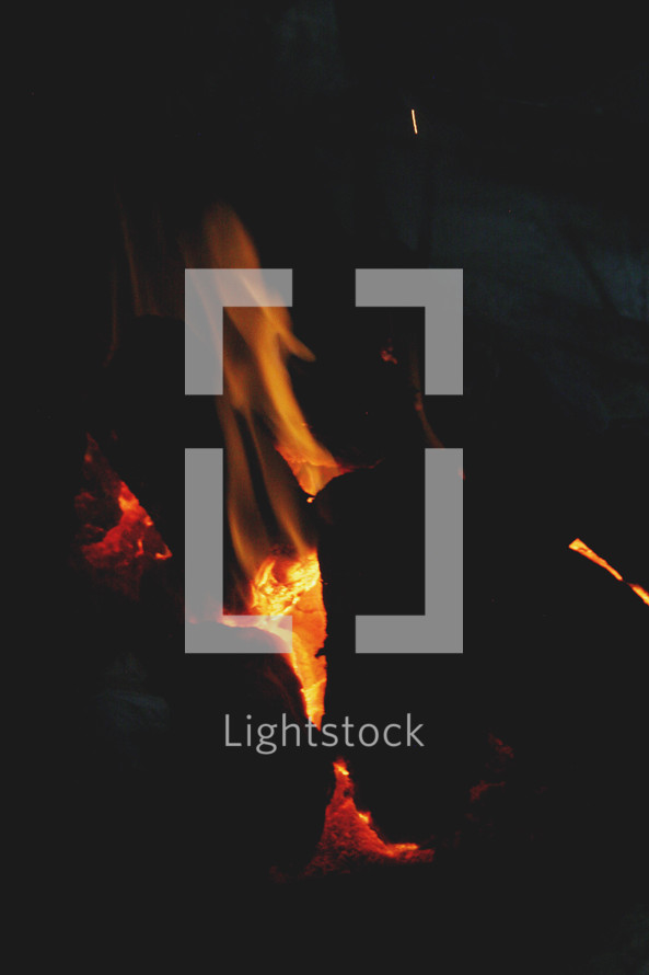 glowing coals in a fire 
