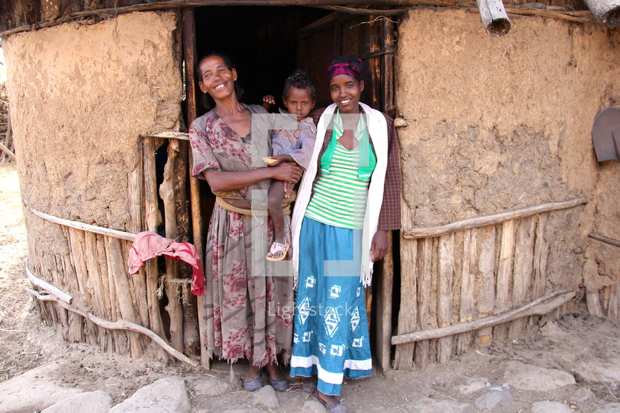 women in a hut in Africa 