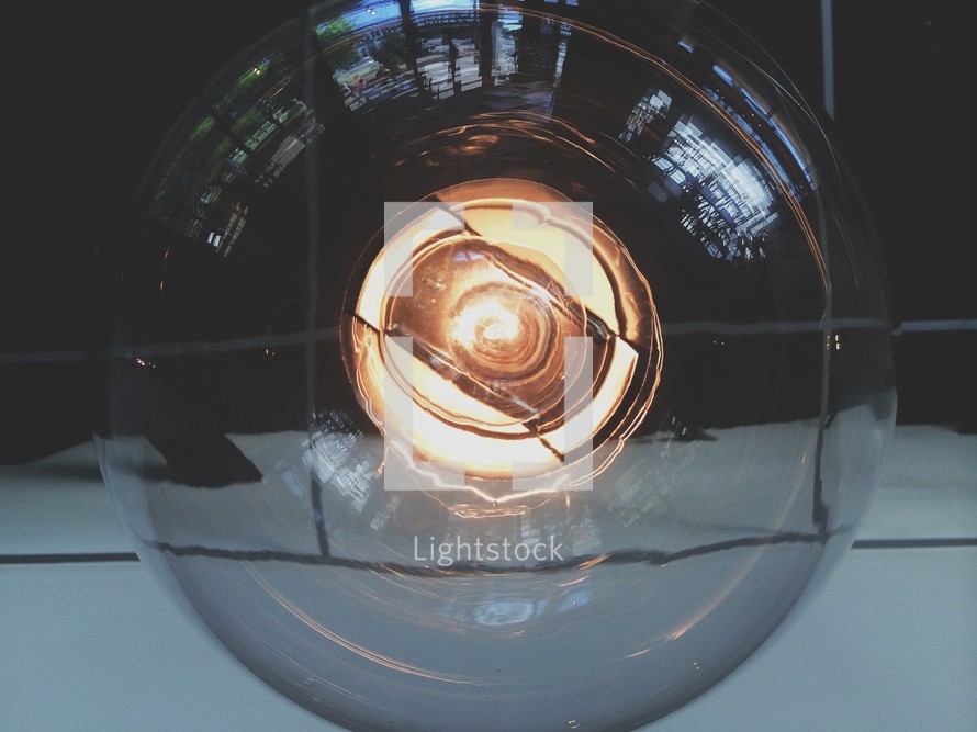 looking up at a lightbulb 