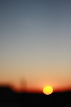 blurry sun at sunset