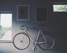 bicycle hanging on a wall 