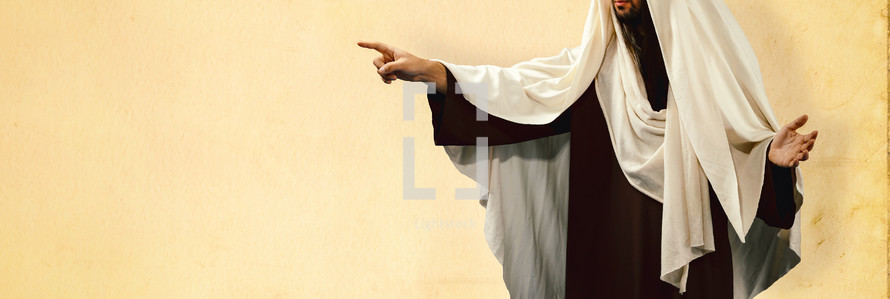 Jesus Christ pointing with hand and finger to the side.