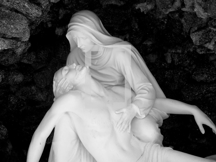 Mary and Jesus  statue called The Pietà (meaning "pity", "compassion") is a subject in Christian art depicting the Blessed Virgin Mary cradling the mortal body of Jesus Christ after his Descent from the Cross. It is most often found in sculpture.
