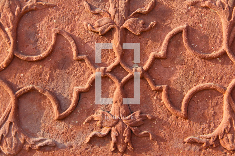 ornate detail on a clay wall