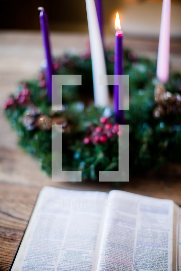 open Bible and Advent wreath 