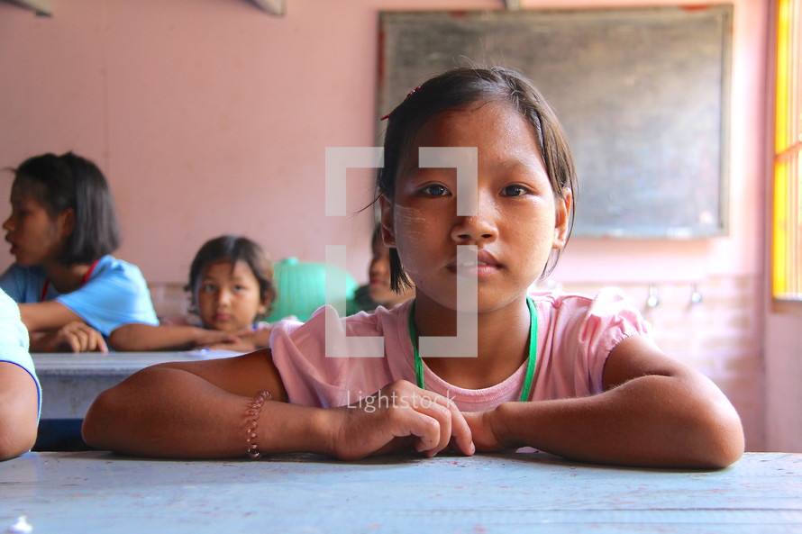 Young girl in classroom in Myanmar