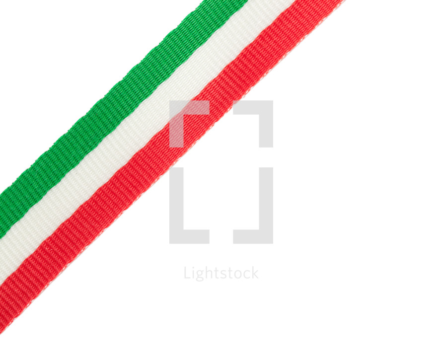tricolor ribbon of the Italian flag placed in the corner on white background.
