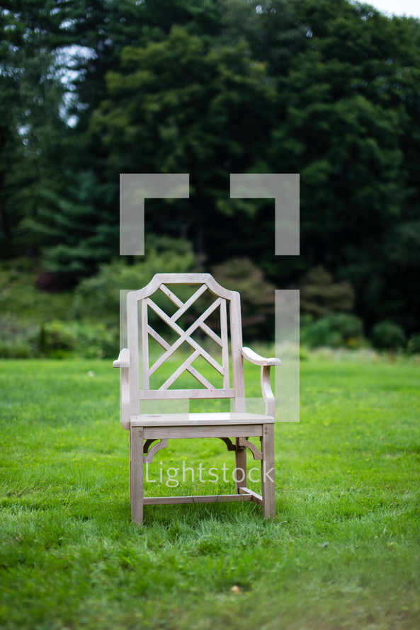 Empty chair in the grass.
