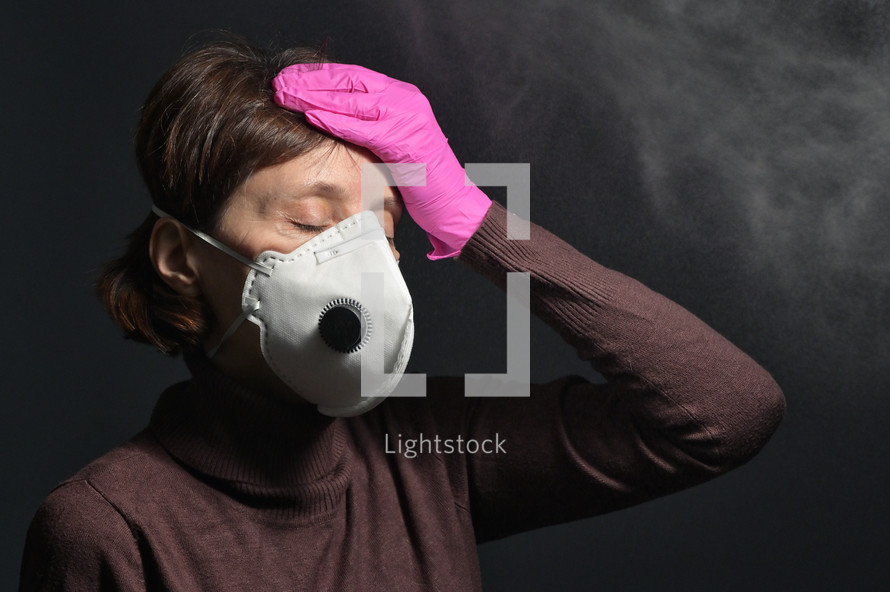 Female wearing a face mask and gloves 