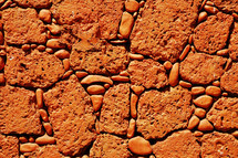 orange red bricks and rocks background