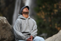 man sitting in prayer 