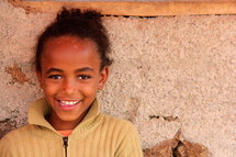 Smiling young girl child in Ethiopia, Africa 