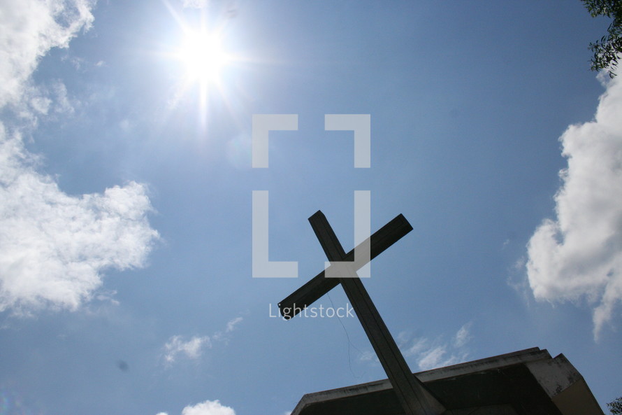 Cross on rooftop