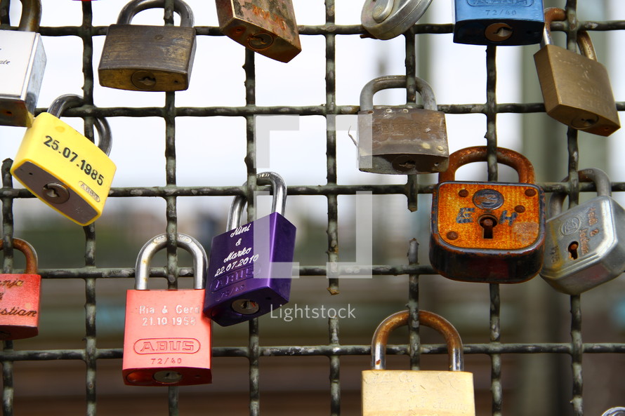 love locks on a fence