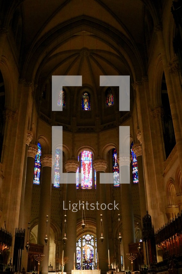 stained glass windows and cathedral altar 