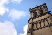 A church tower against blue sky.