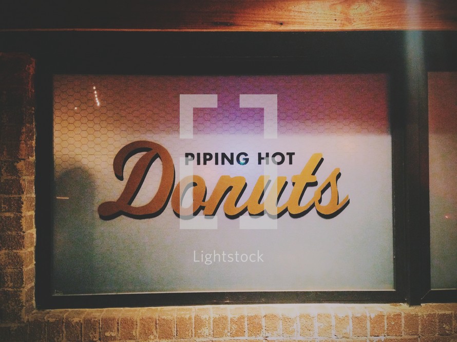 Donut shop sign - piping hot donuts 