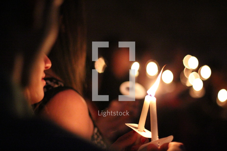 candles at a Christmas Eve worship Service 